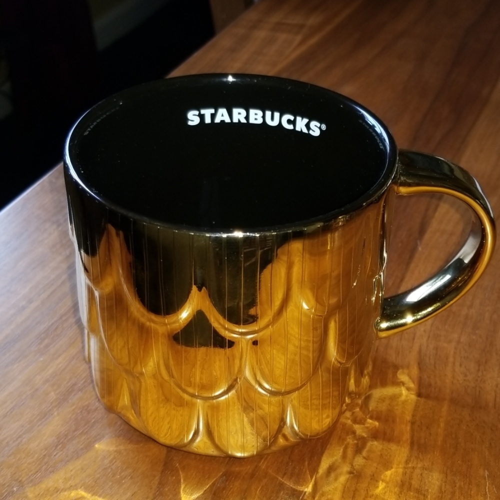 Sold!   New never used starbucks 2019 gold holiday mug